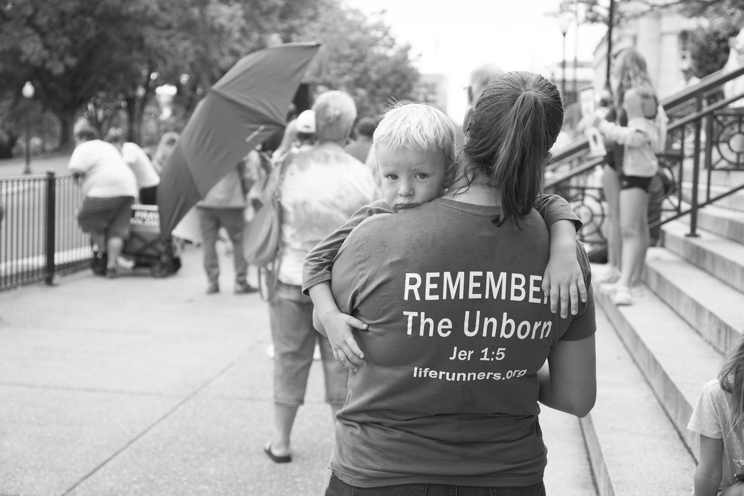 A mother and child take part in the Decision Day Rally outside the Missouri Supreme Court Building on June 24.